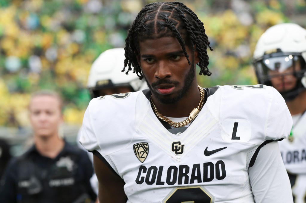 Colorado quarterback Shedeur Sanders (2) walks off the field following a game in September 2023.