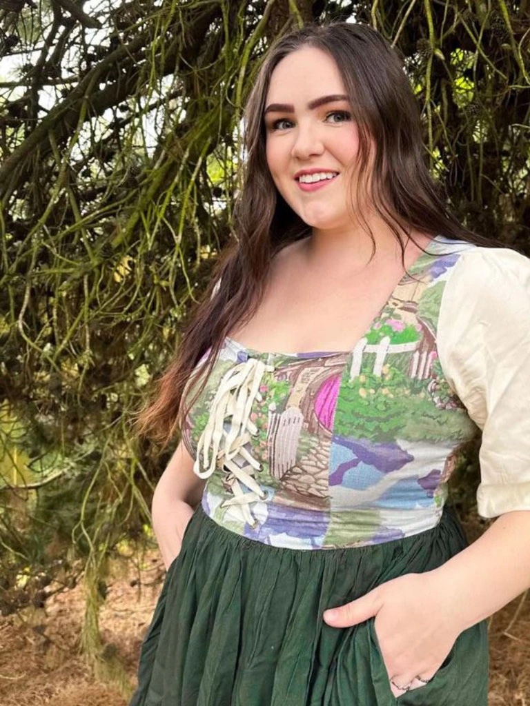 Jo Danvers standing in front of a tree after sharing her bizarre dental experience online