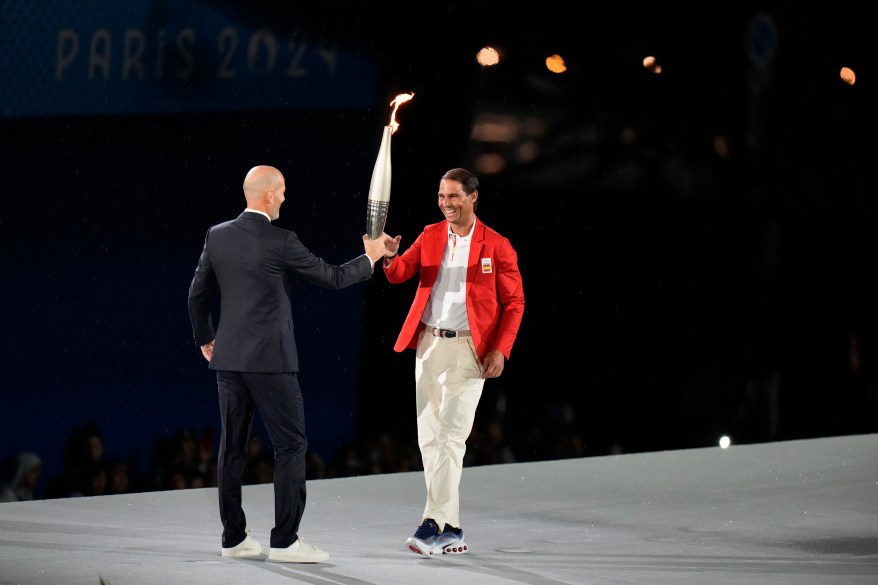 Zinedine Zidane hands the torch over to Rafael Nadal.