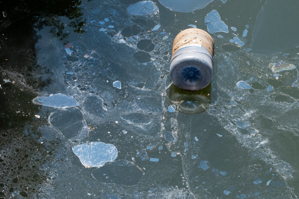 A barrel floats on the polluted Gowanus Canal.