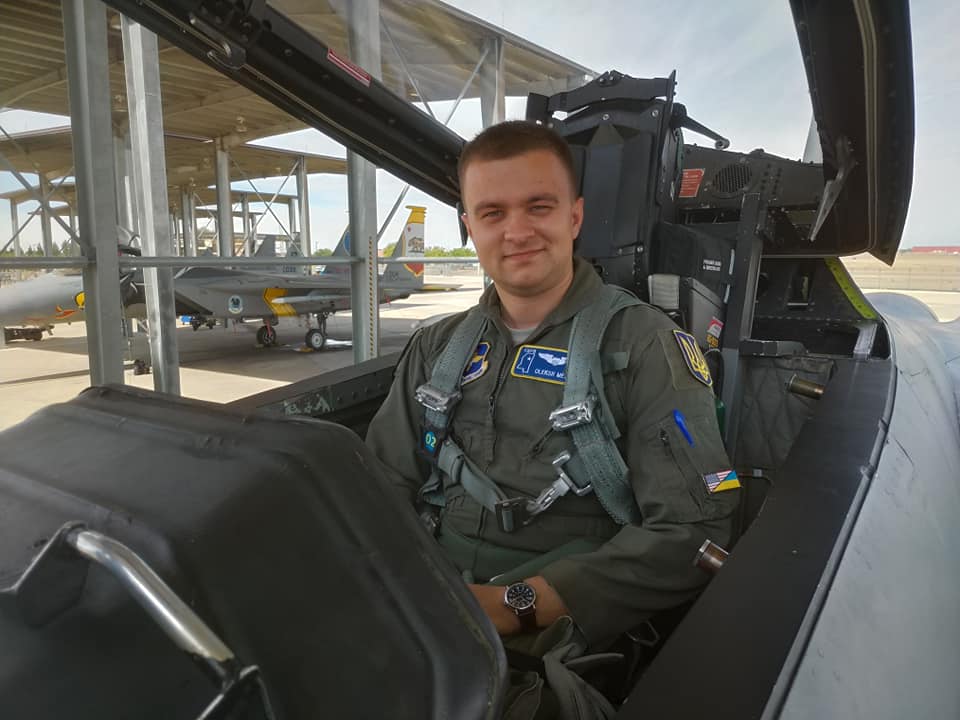 Ukrainian pilot Lt. Col. Oleksiy Serhiyovych Mes sitting in the cockpit of a F-16 jet in a 2019 Facebook photo