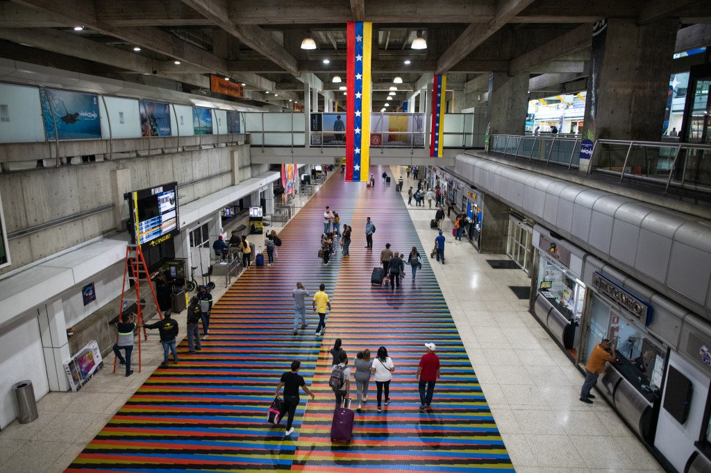 Travelers at Simon Bolivar International Airport (CCS) in Maiquetia, Vargas state, Venezuela in Maiquetia, Venezuela, on Friday, March 3, 2023. 