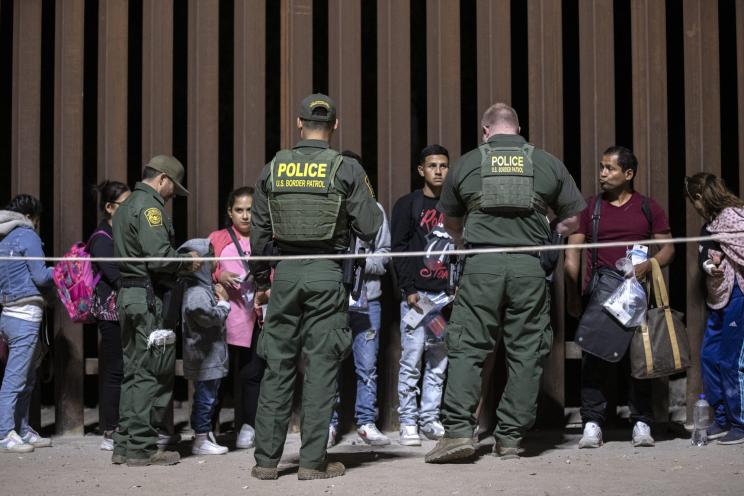 Migrants are processed by Border Patrol officers after they crossed in the US illegally, in Yuma, Arizona, USA, 11 May 2023