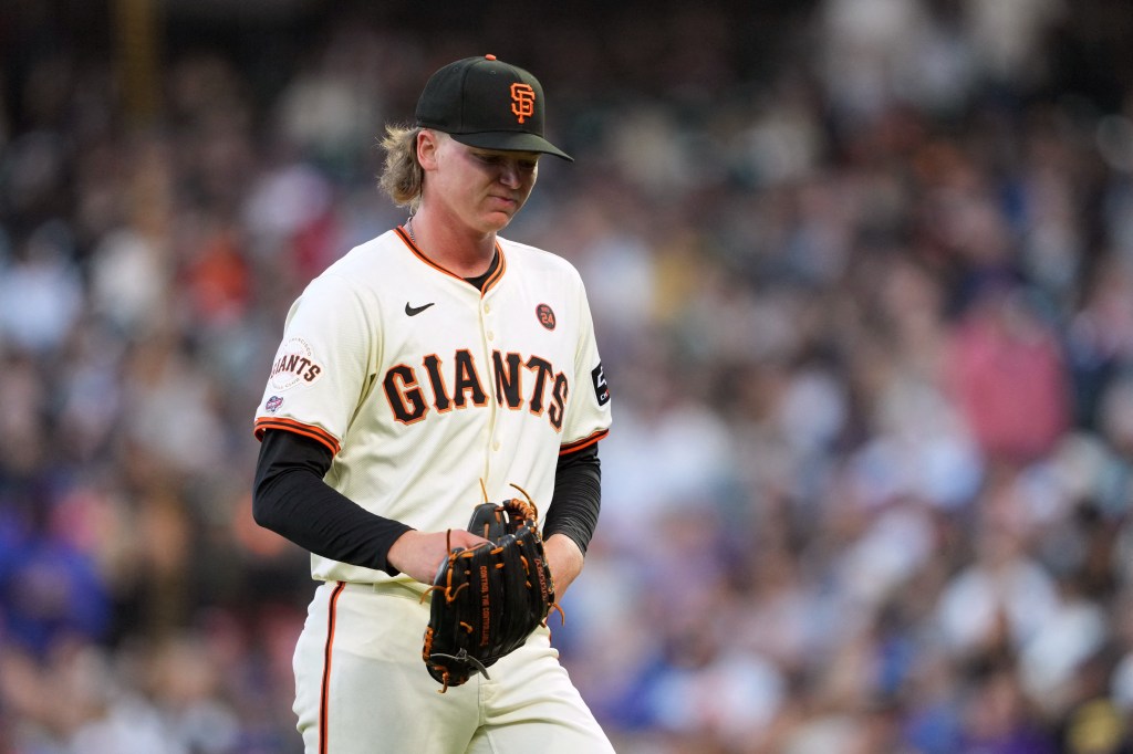 San Francisco Giants starting pitcher Hayden Birdsong (60) walks to the dugout after being removed from the game during the fifth inning against the Chicago Cubs at Oracle Park. 