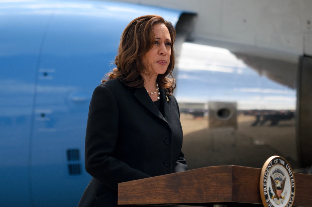 2024 Democratic Presidential Candidate Kamala Harris delivering remarks at a podium before departing George Bush Intercontinental Airport in Houston, Texas