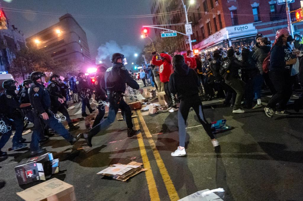 Cops and protesters clash in the streets of NYC.