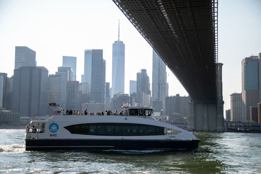 A NYC Ferry leaves Dumbo on June 18, 2023.