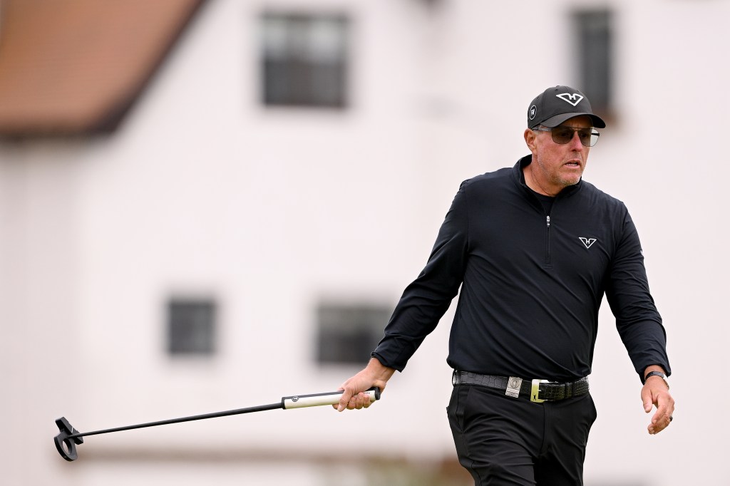 Phil Mickelson of the United States reacts to a putt on the 17th green during day four of The 152nd Open championship at Royal Troon on July 21, 2024 in Troon, Scotland.