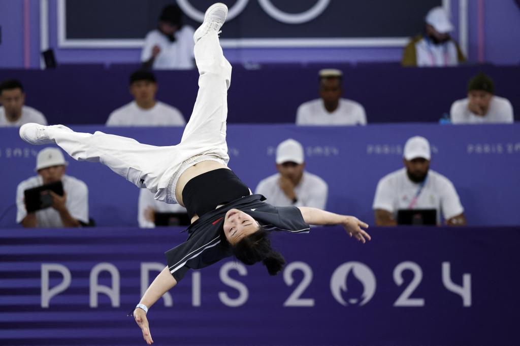 China's Liu Qingyi known as  671 competes in the Women's Breaking dance semi-final of the Paris 2024 Olympic Games at La Concorde in Paris, on August 9, 2024. 