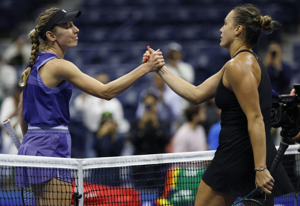 Aryna Sabalenka (right) shakes hands with Ekaterina Alexandrova  after her third round U.S. Open victory in a match that started at 12:07 a.m. on Aug. 31, 2024.