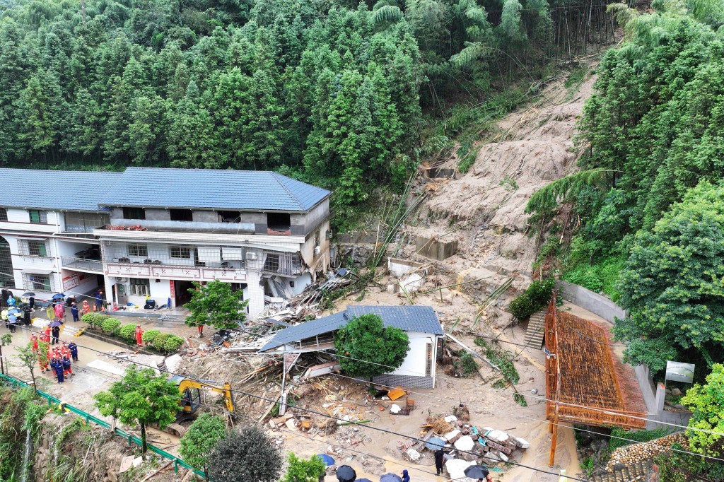 a landslide destroys a house in Yuelin village of Shouyue town of Hengyang city, central China's Hunan Province on July 28, 2024.