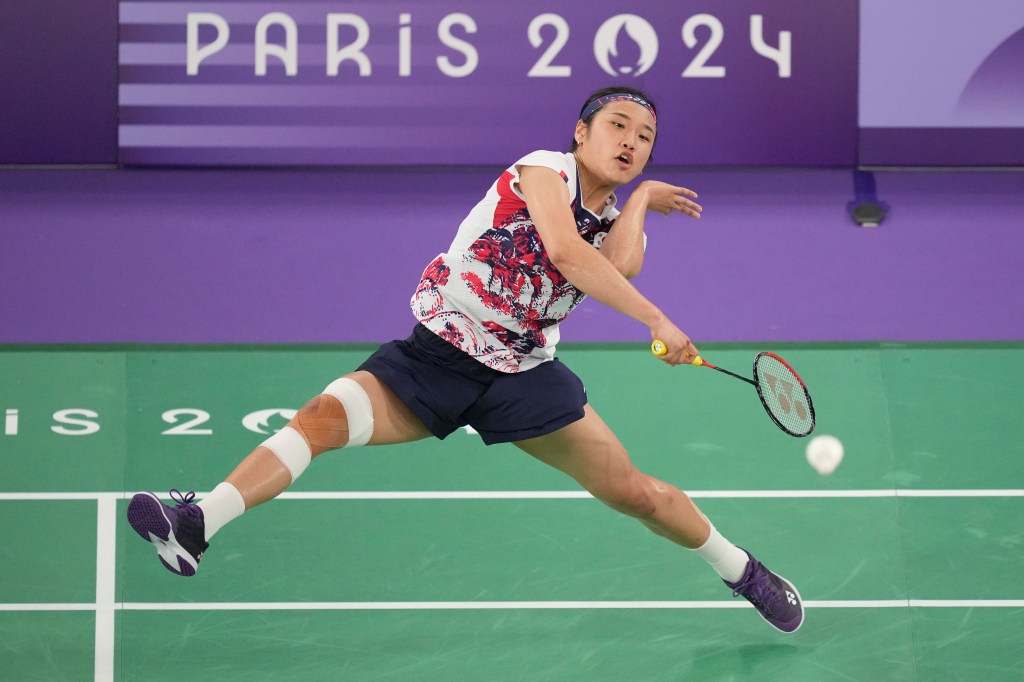 South Korea's An Se-young opposing China's He Bingjiao in women's singles badminton gold medal match at the 2024 Summer Olympics in Paris, France.