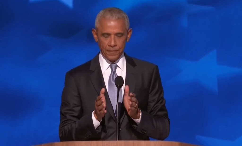 Former President Obama appeared to make a provocative gesture with his hands while talking about Trump's "weird obsession with crowd sizes."