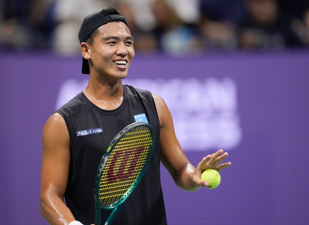 Li Tu, of Australia, reacts during a match against Carlos Alcaraz, of Spain during the first round of the U.S. Open tennis championships, Tuesday, Aug. 27, 2024, in New York. 