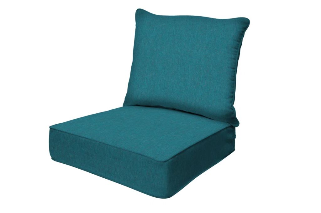 A seat cushion in the color teal.