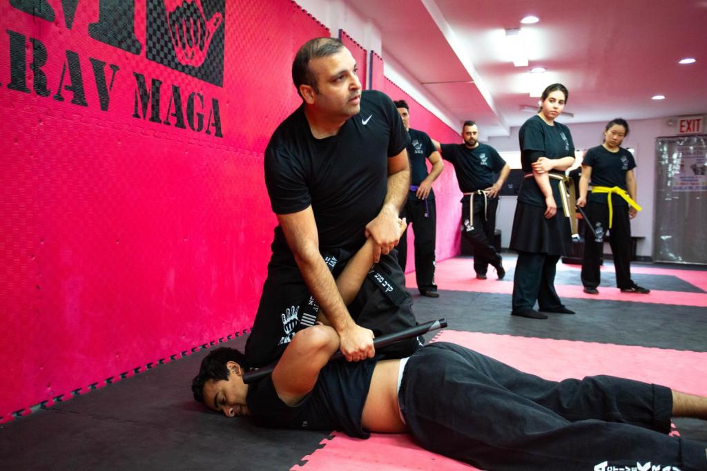 Avi Abraham pins an opponeent to the mat at Active Krav Maga. 