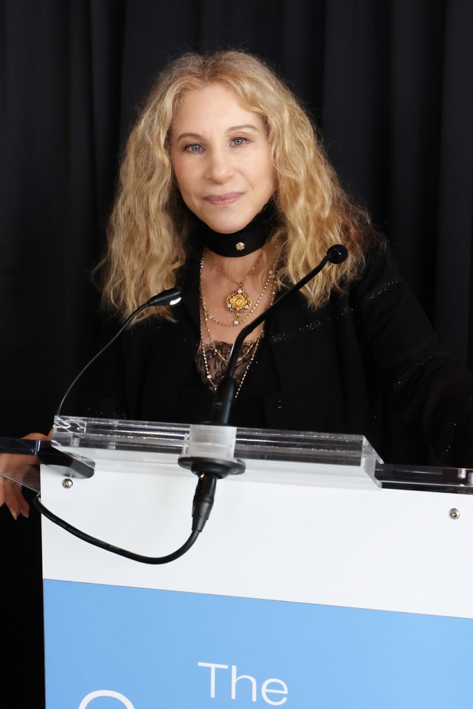 Barbra Streisand at a podium