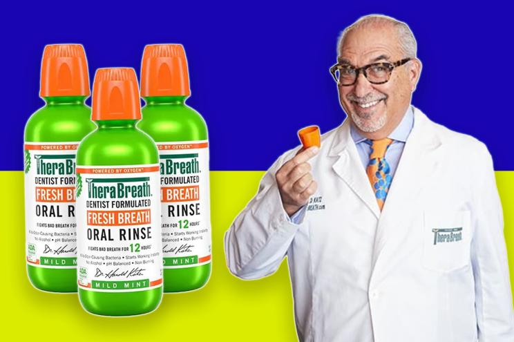 A man in a white coat with orange and green bottles