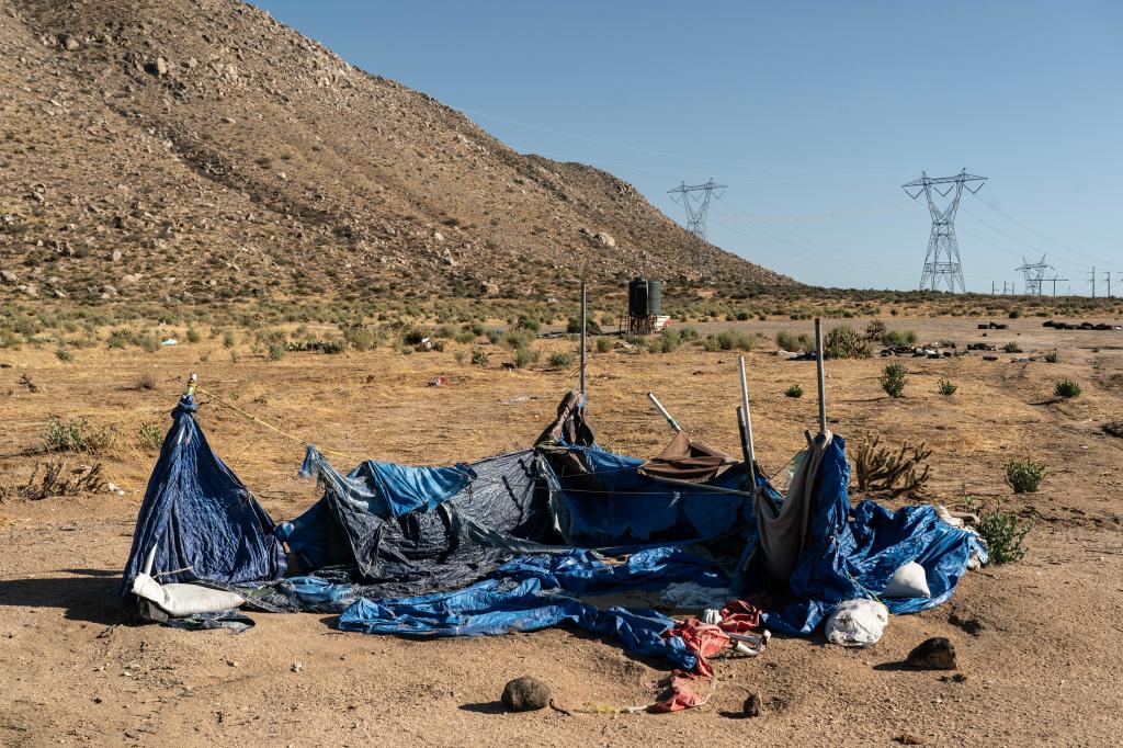 A migrant encampment is seen near the border in Jacumba California