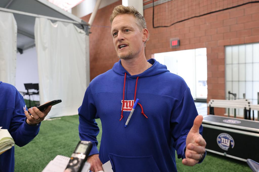 Giants outside linebackers coach Charlie Bullen addresses reporters on Aug. 11.