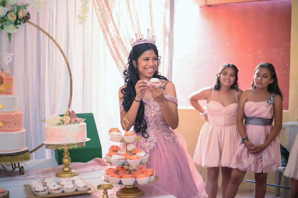 Débora Rebeca Xi Artola in a pink ballgown at her birthday party.