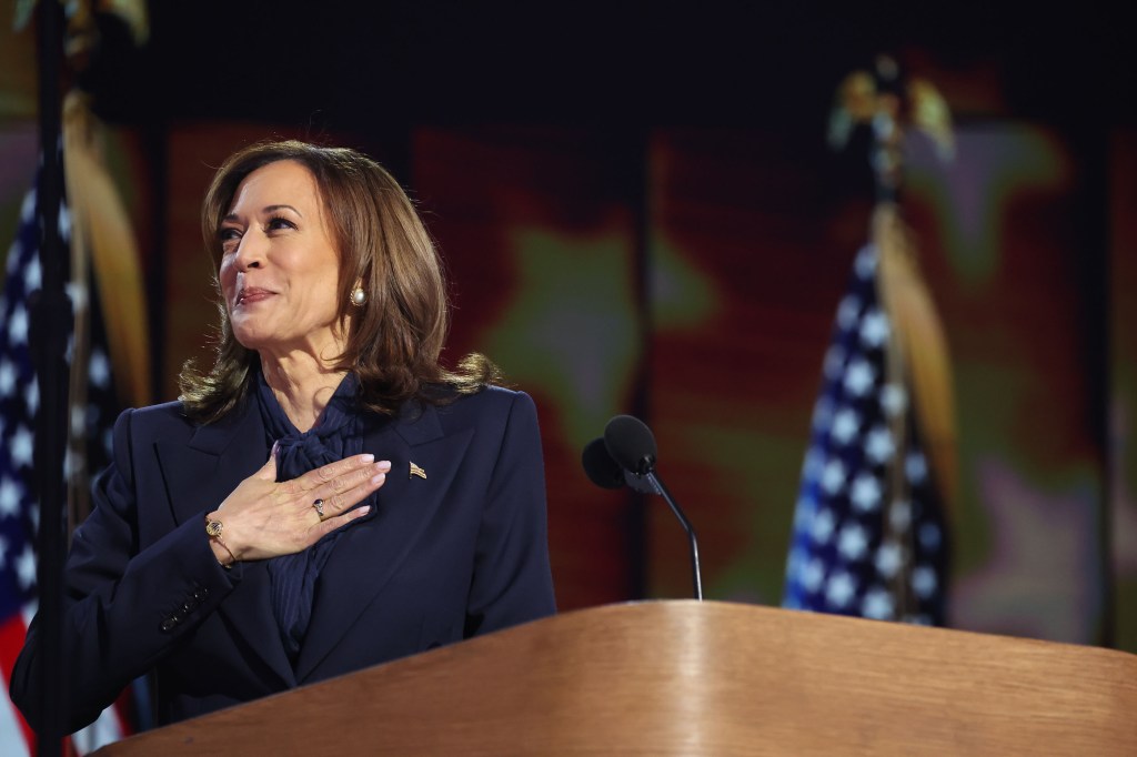 Democratic presidential nominee Vice President Kamala Harris greets delegates during the Democratic National Convention at the United Center on Thursday, Aug. 22, 2024, in Chicago.