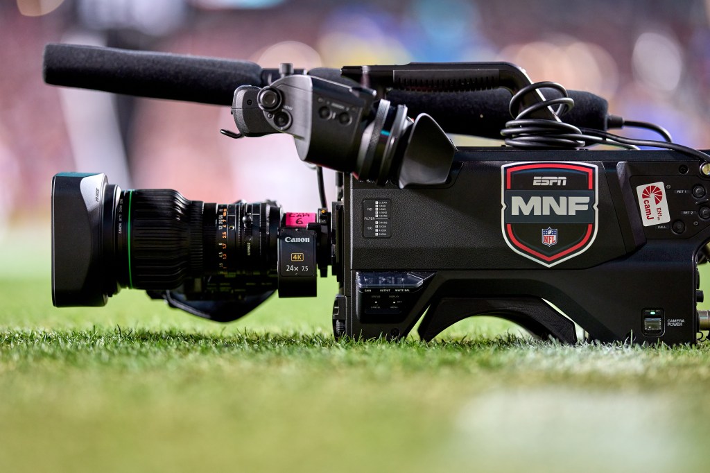 A Monday Night Football camera on a football field