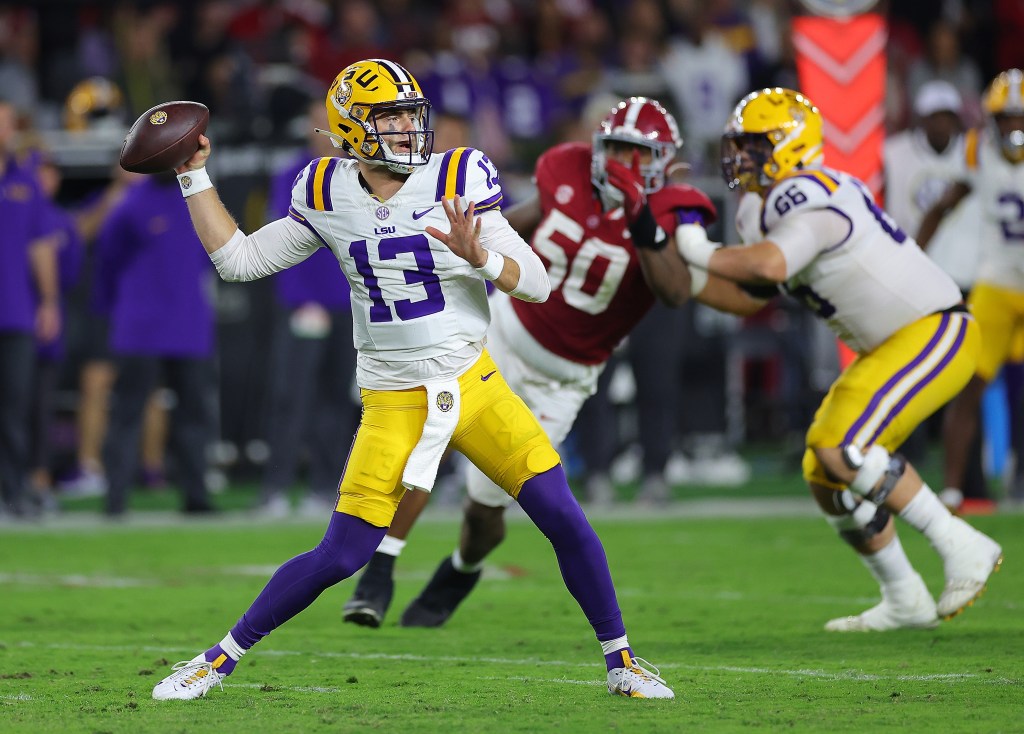 Garrett Nussmeier #13 of the LSU Tigers looks to pass against the Alabama Crimson Tide