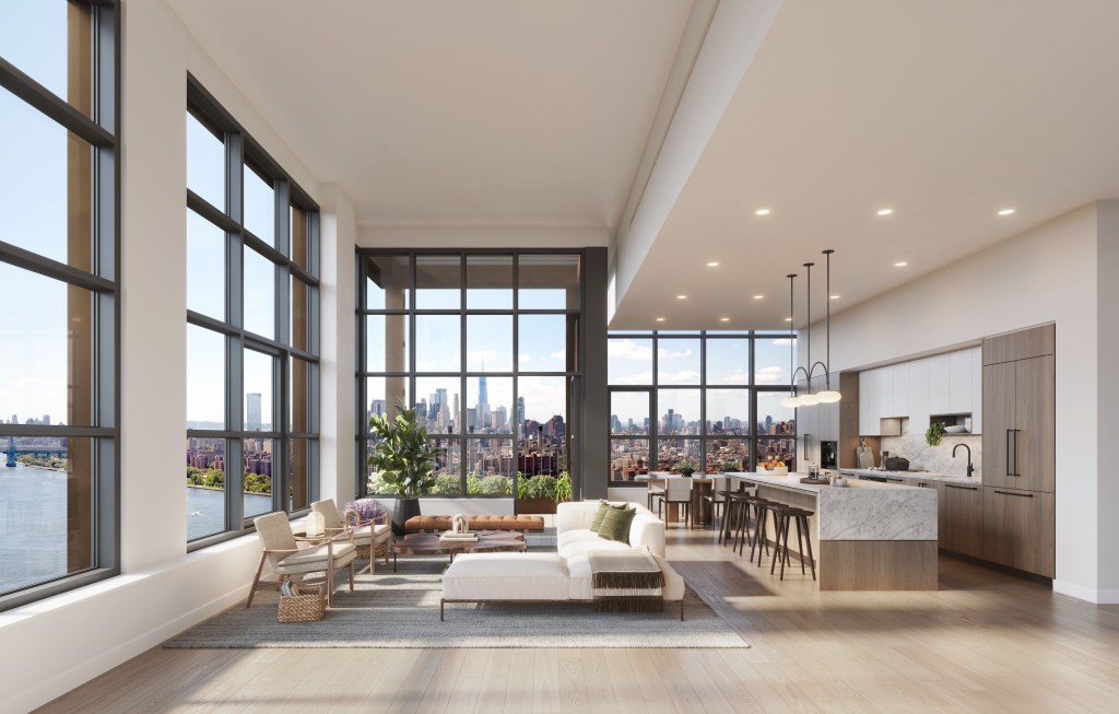 Floor to ceiling windows flood the home with light and water views 