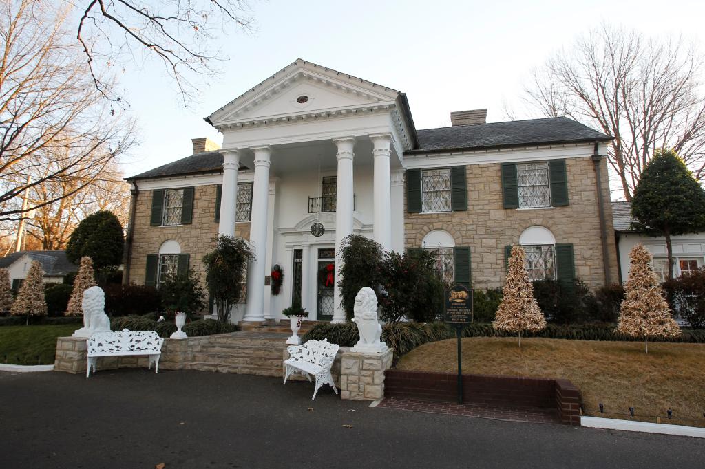 A large house with columns and a porch, known as Graceland, Elvis Presley's home, in Memphis, Tennessee, as seen on January 7, 2011.