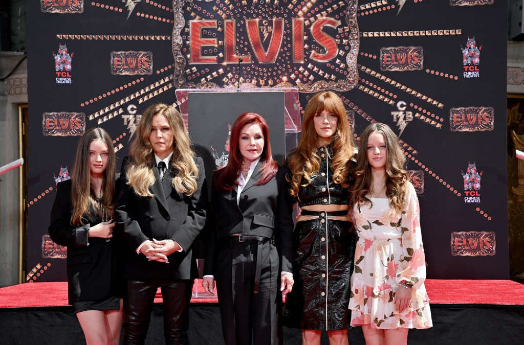 Harper Vivienne Ann Lockwood, Lisa Marie Presley, Priscilla Presley, Riley Keough, and Finley Aaron Love Lockwood standing together at the Handprint Ceremony at TCL Chinese Theatre, Hollywood, California