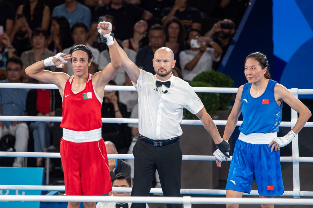 Imane Khelif of Algeria celebrates her gold medal win during Women's 66kg - Final match against Liu Yang of People's Republic of China