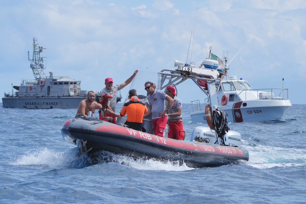 Two bodies have been found inside the wreckage of the Bayesian superyacht as divers search for the four others.