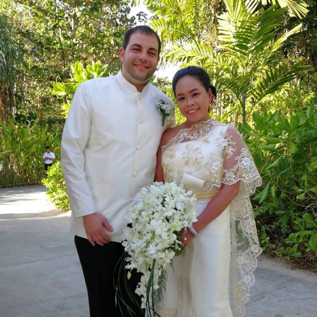 Jeffrey Piccolo and Kanokporn Tangsuan, a doctor at NYU Langone hospital, posing for a picture together