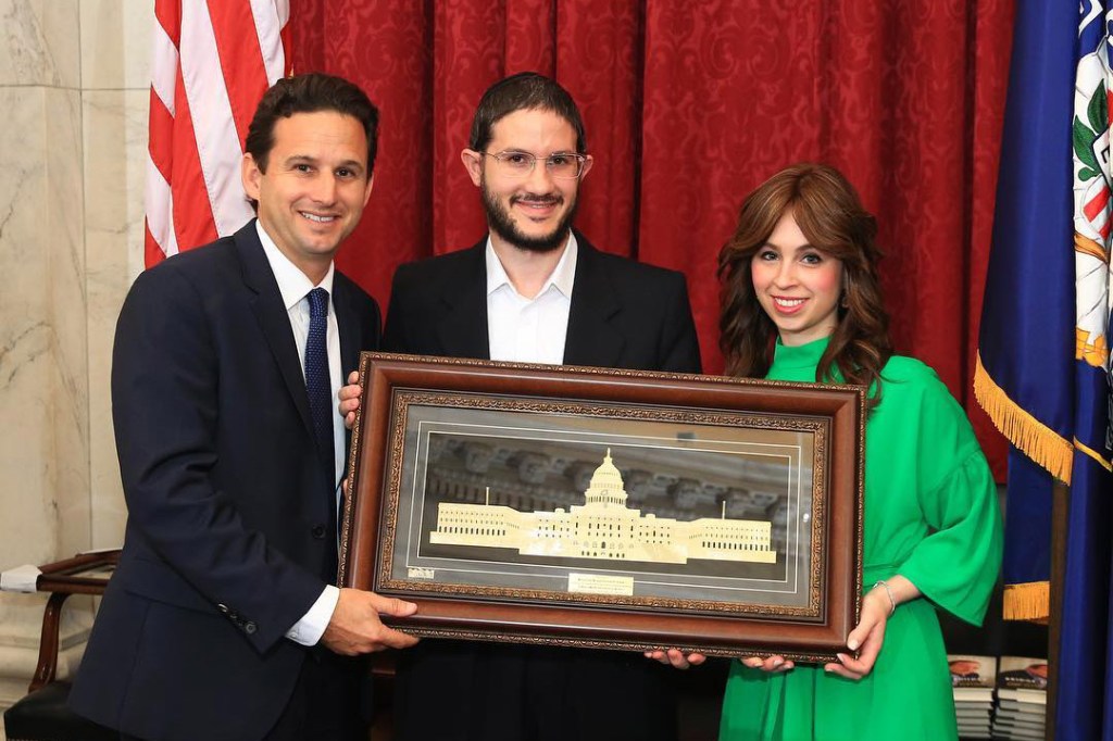 Menachem Kiwak pictured with Senator Brian Schatz and Breinde Kiwak