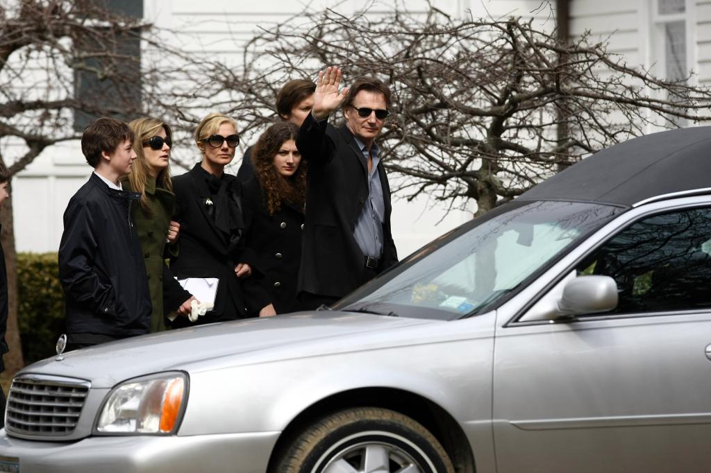 Liam Neeson and family at Natasha's funeral.