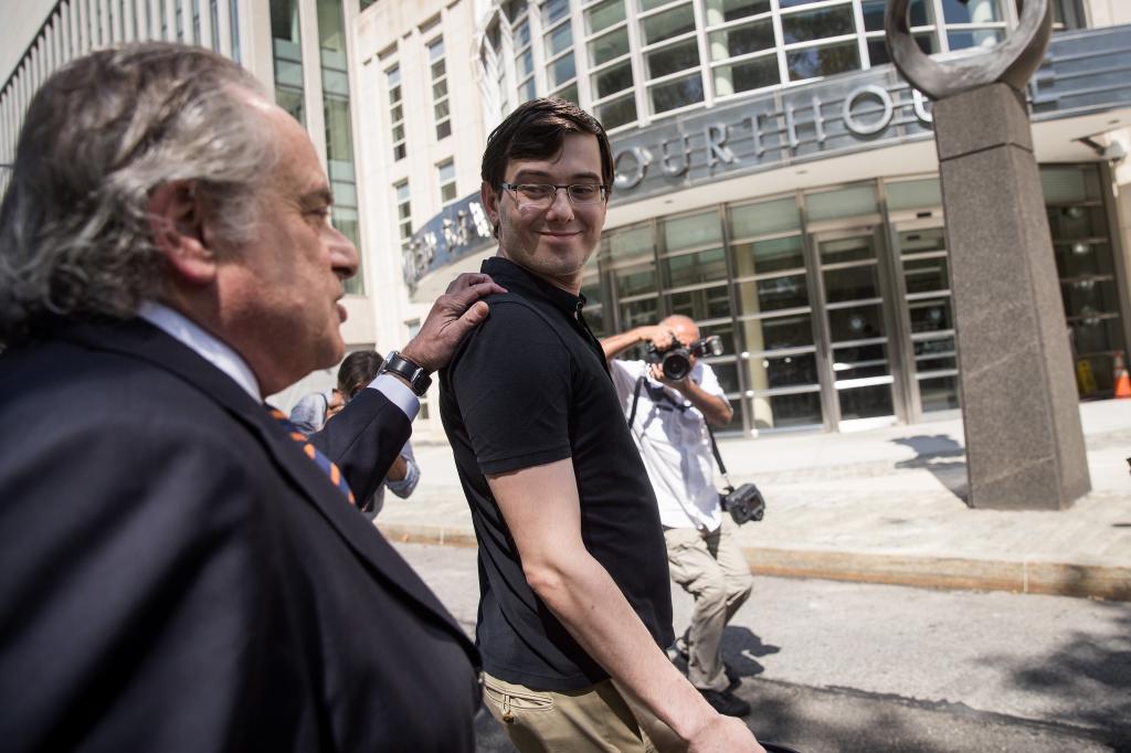 Lead defense attorney Benjamin Brafman walks with former pharmaceutical executive Martin Shkreli after the jury issued a verdict at the U.S. District Court for the Eastern District of New York, August 4, 2017 in the Brooklyn borough of New York City. 