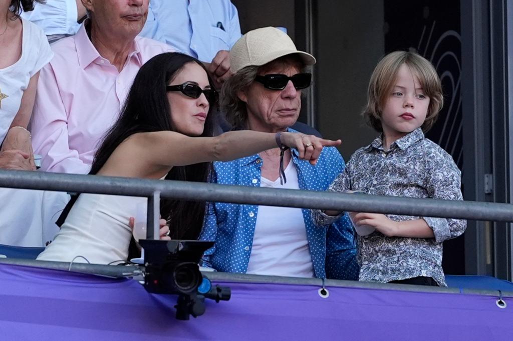 Melanie Hamrick, Mick Jagger and their son Deveraux.