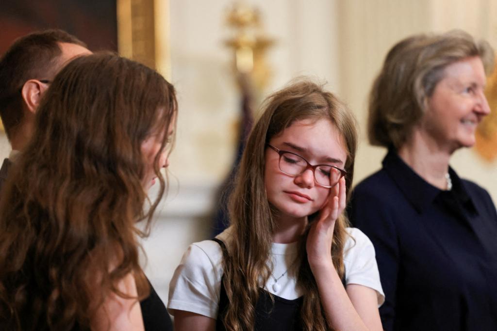 Miriam Butorin, daughter of Alsu Kurmasheva, reacts during an event where U.S. President Joe Biden speaks about the release of Paul Whelan, Evan Gershkovich, Alsu Kurmasheva, and Vladimir Kara-Murza, who were detained in Russia, at the White House in Washington, U.S., August 1, 2024.