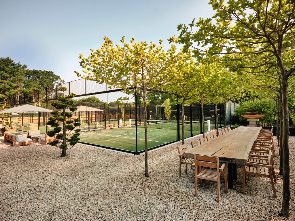 A table and chairs set up in the courtyard of the Montauk Yacht NAOA Easy in the Hamptons during the US Open