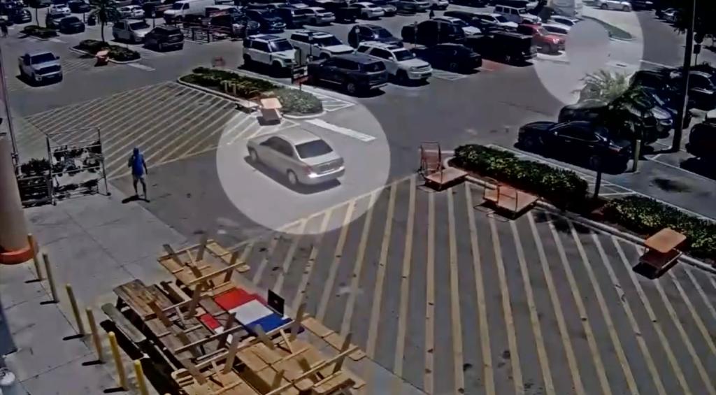 Surveillance footage of Hurley's car in the parking lot.