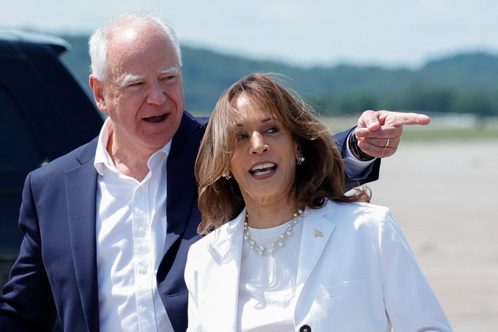 Kamala Harris and her newly named running mate Minnesota Gov. Tim Walz arrive at Chippewa Valley Regional Airport in Eau Claire, Wisconsin.