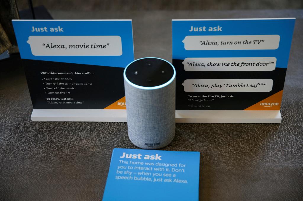 Amazon Echo smart speaker and prompts for using Alexa personal assistant in Amazon experience center in Vallejo, California.