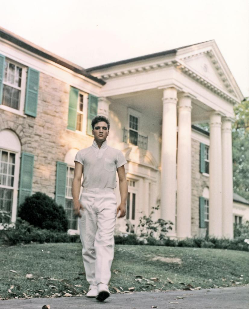 Elvis Presley walking on the grounds of his Graceland estate, circa 1957