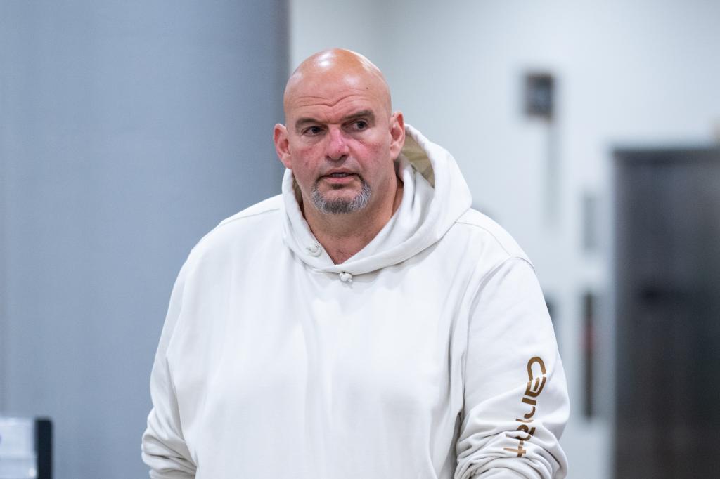 Sen. John Fetterman, D-Pa., walks through the Senate subway in the Capitol after a vote on Wednesday, May 15, 2024.