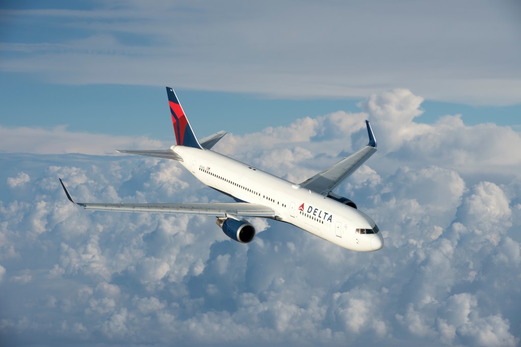 A Delta plane (not pictured) flying over the Atlantic Ocean was forced to quickly turn around and retreat back to Boston following a lightning strike Sunday, the airline and the FAA said.