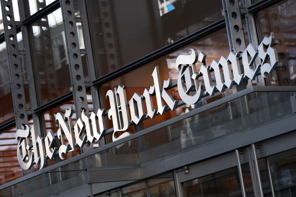 Sign for The New York Times hanging above the entrance to its building in New York, captured on May 6, 2021.