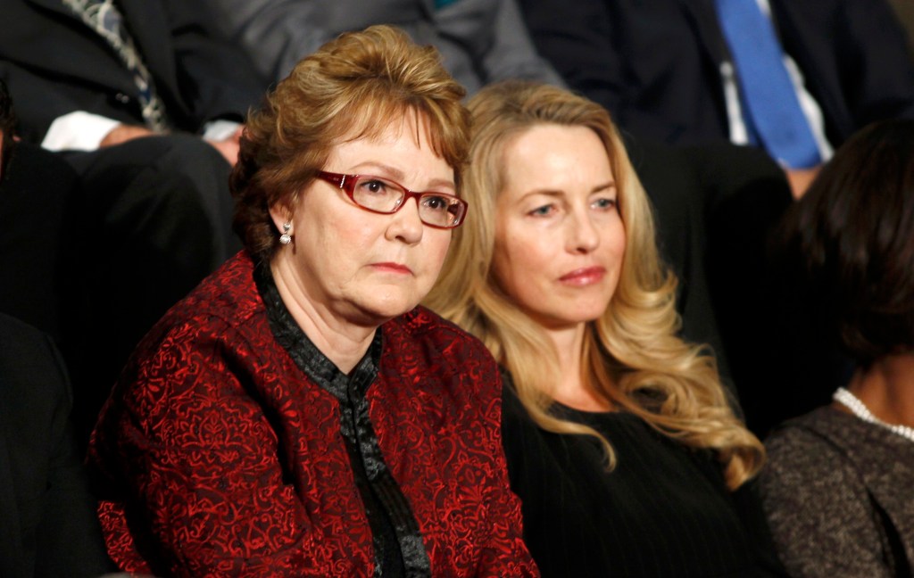 In 2011, Buffett noted that he pays a lower tax rate than his secretary, Debbie Bosanek, who is seen seated left next to Laurene Powell Jobs at the January 2012 State of the Union address.