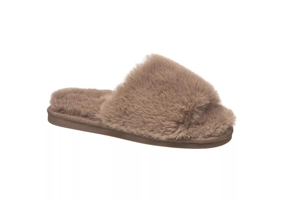 A furry slipper on a white background