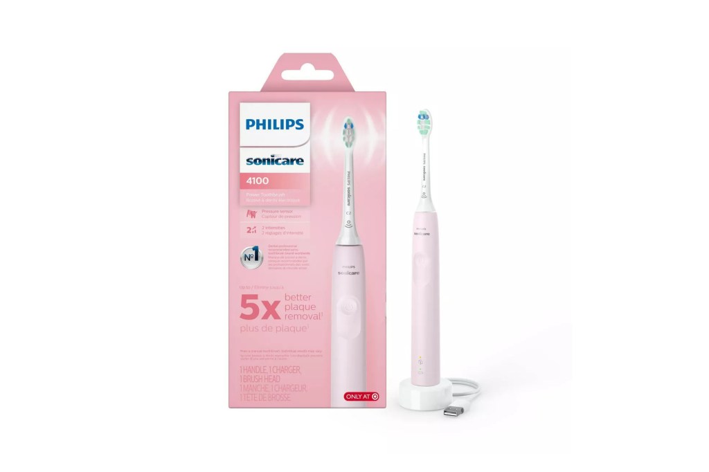 A pink Sonicare toothbrush in a box